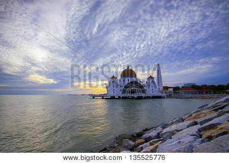 Majestic view of Malacca Straits Mosque during sunset.