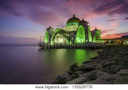 Majestic view of Malacca Straits Mosque during sunset.