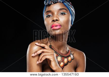 Close up portrait of an attractive african american fashion woman looking at camera