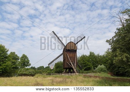 Brede, Denmark - June 23, 2016: A historic windmill in the Frilands Museum.