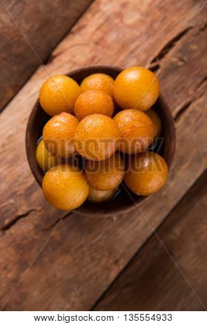 Gulab jamun, or gulaab jamun, is a milk-solids-based sweet mithai
