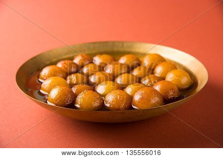 Gulab jamun, or gulaab jamun, is a milk-solids-based sweet mithai