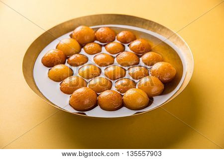 Gulab jamun, or gulaab jamun, is a milk-solids-based sweet mithai