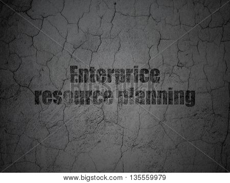 Finance concept: Black Enterprice Resource Planning on grunge textured concrete wall background