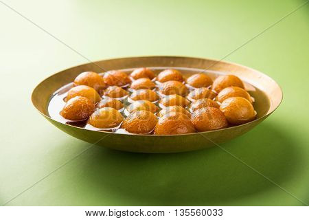 Gulab jamun, or gulaab jamun, is a milk-solids-based sweet mithai