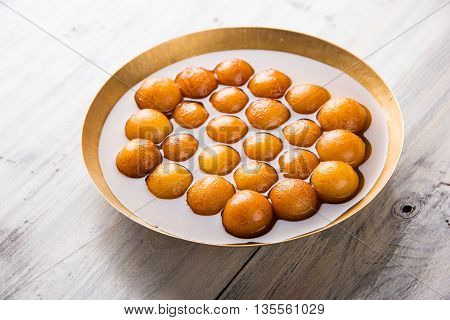 Gulab jamun, or gulaab jamun, is a milk-solids-based sweet mithai