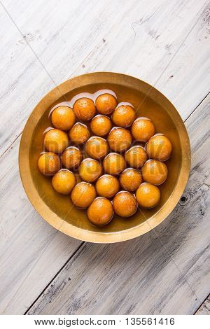 Gulab jamun, or gulaab jamun, is a milk-solids-based sweet mithai