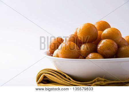 Gulab jamun, or gulaab jamun, is a milk-solids-based sweet mithai