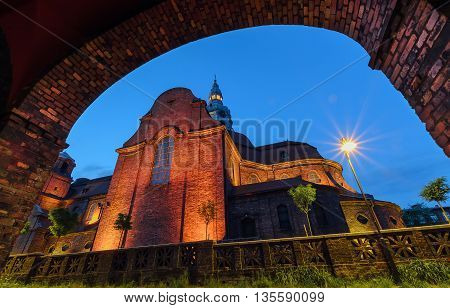 View on the Church from under the arch in historical part of Katowice Poland