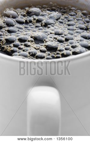 Varm kogende kop kaffe