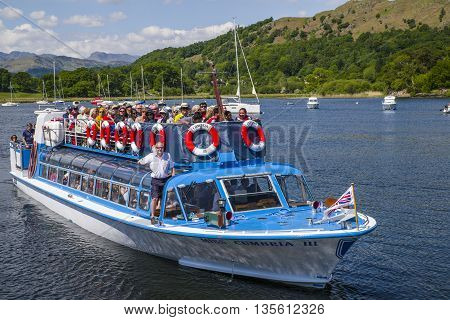 CUMBRIA UK - MAY 29TH 2016: A view of the Miss Cumbria III tourist boat at Waterhead near Ambleside on Lake Windermere in the Lake District National Park on 29th May 2016.