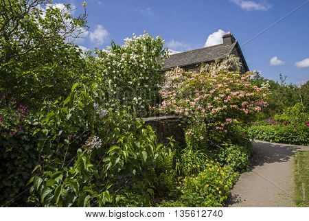 CUMBRIA UK - MAY 30TH 2016: The beautiful grounds of Hill Top - a 17th Century House once home to childrens author Beatrix Potter taken on 30th May 2016.