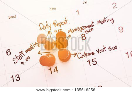 Pushpin on calendar with busy day overworked schedule with filter.