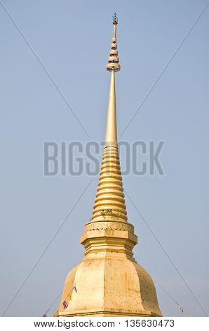Holy Thai golden pagoda with blue sky