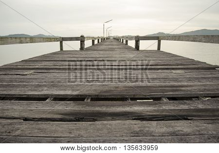 The wood bridge on the time in beautiful day, Ranong Thailand