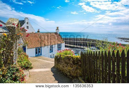 Crail Scotland - July 26 2012: Fife area traditional houses on the harbor.