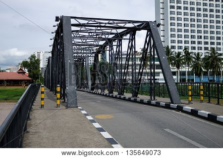 Iron Bridge one of the symbolics of Chiang Mai city located above Mae Ping river. June 22-2016 Chiang Mai Thailand.