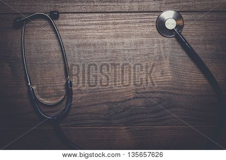 statoscope on the brown wooden table background