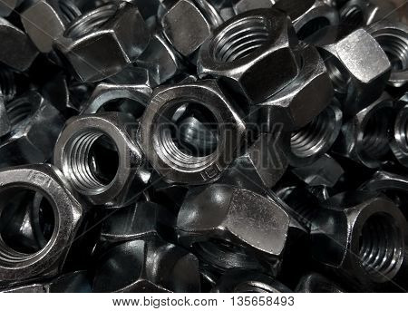Hex screw nuts in box at the hardware shop