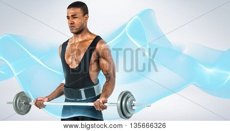 Bodybuilder lifting heavy barbell weights against grey background