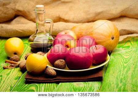 Natural Food With Flagon On Green Wood