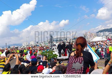 QUITO, ECUADOR - JULY 7, 2015: Pope Francisco mass making a little round trip around the big mass on Ecuador, popemobile.