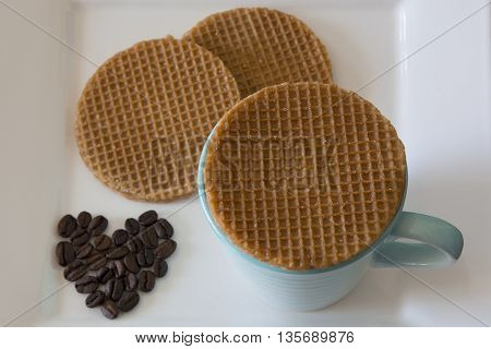 Coffee and soft toasted dutch waffles filled with caramel
