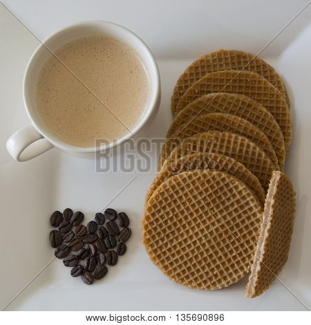 Coffee and soft toasted dutch waffles filled with caramel