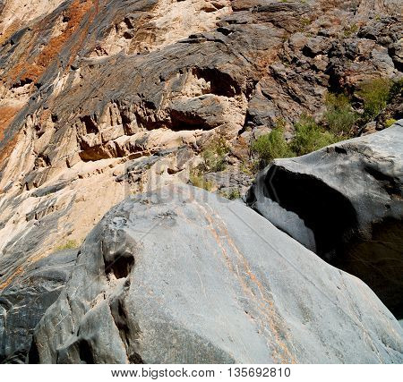 In Oman  The Old Mountain Gorge And Canyon The Deep Cloudy  Sky