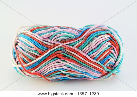 bale of wool of different colors with white background