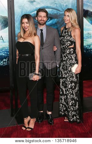NEW YORK-DEC 7: (L-R) Renee Puente, Matthew Morrison and Marlett attend the New York premiere of 
