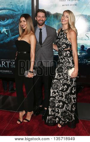 NEW YORK-DEC 7: (L-R) Renee Puente, Matthew Morrison and Marlett attend the New York premiere of 