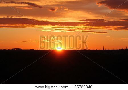 sunrise / sunset with an urban silhouette