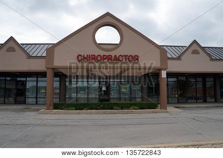 SHOREWOOD, ILLINOIS / UNITED STATES - AUGUST 30, 2015: One may receive chiropractic and acupuncture treatments at the Chiropractor's office in Shorewood's Apple Tree Plaza.