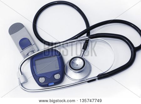 Stethoscope and device for measuring blood sugar level and isolated on white background
