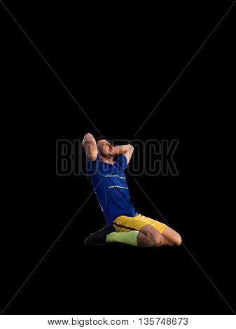 Frustrated soccer player in blue uniform isolated on football training isolated