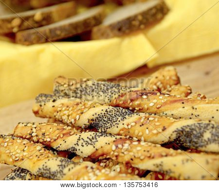salty sticks with sesame and poppy seeds, Bread sticks or Pretzel sticks