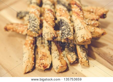 salty sticks with sesame and poppy seeds, Bread sticks or Pretzel sticks