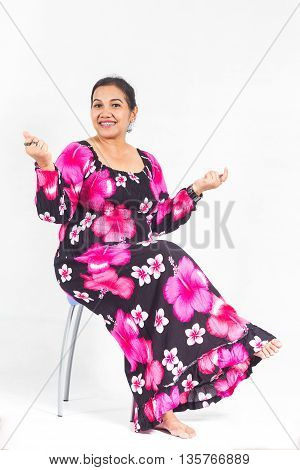 Thai Plump Woman With Colotful Dress