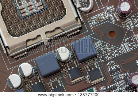 Socket electronics components on PC computer mainboard and have concept about technology.