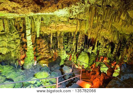 Tourists Go Down To The Psychro Cave (cave Of Zeus). Cretegreece.