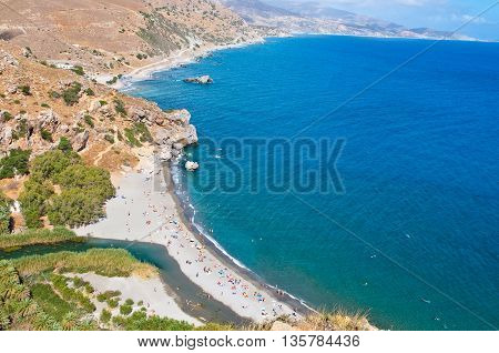 Preveli beach and lagoon seen from the mouth of the Kourtaliotiko gorge on the Crete island Greece.