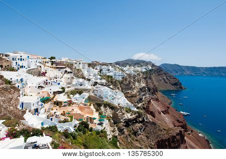 Oia on the Island Santorini Greece. In the centr island.