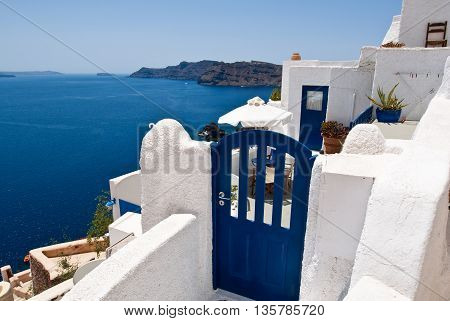 Oia apartments on the top of the volcanic crater on the island of Thera (Santorini) Greece.