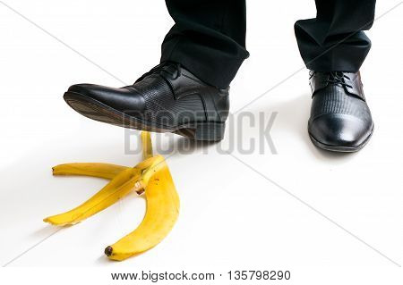 Walking Businessman Is Going To Slip On Banana Peel.