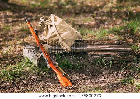 Soviet Russian Rifle Of World War II In Forest Camp