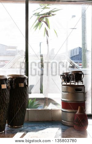 Musical Instruments Including Bongo And Drums In A Room