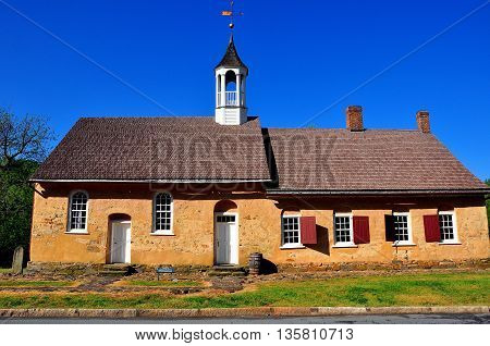 Bethabara North Carolina - April 23 2016: 1788 Gemeinhaus Moravian Church with attached minister's house at Bethabara historic settlement *