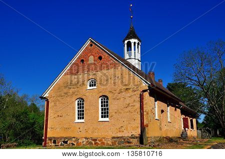 Bethabara North Carolina - April 23 2016: 1788 Gemeinhaus Moravian Church with attached minister's house at Bethabara historic settlement *