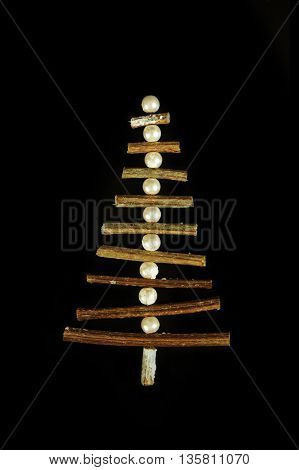 New year tree decorations made of sticks. Vintage christmas card with handmade christmas tree. X-mass concept.